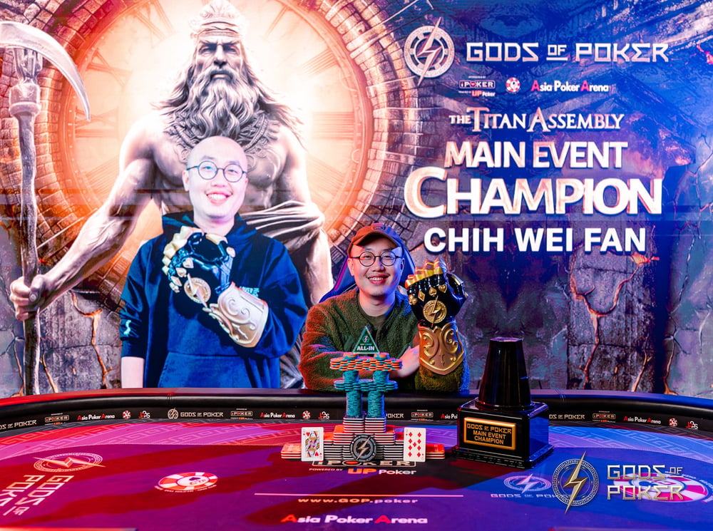 Chih Wei Fan, Gods Z Poker Main Event Champion, smiles with his prestigious trophy.