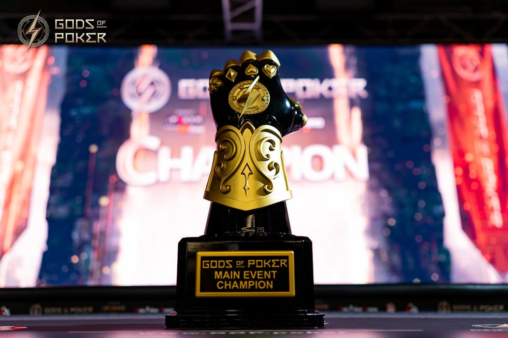 Golden and black gauntlet trophy for Gods of Poker Main Event Champion.
